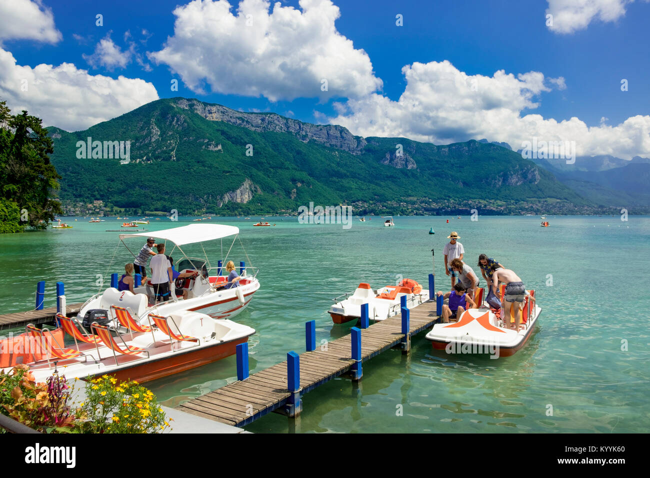 Boats on the lake at Annecy, Lac d'Annecy, Haute Savoie, France, Europe with mountains behind in summer Stock Photo