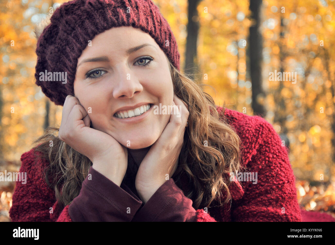 Portrait of smiling young adult woman Stock Photo