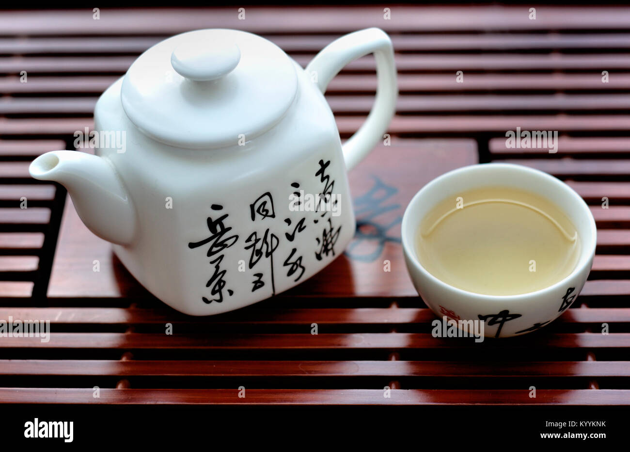 Teapot and cup of tea Stock Photo