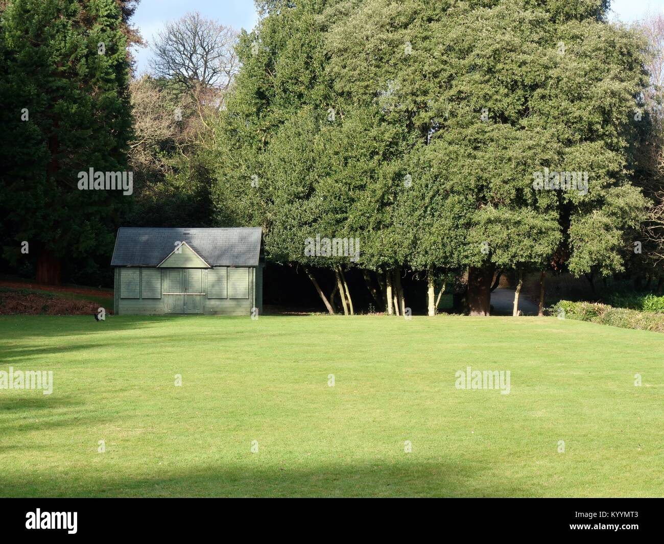 Green hut and bowling green / croquet lawn facility at Christchurch Park. Ipswich, Suffolk, UK. Stock Photo