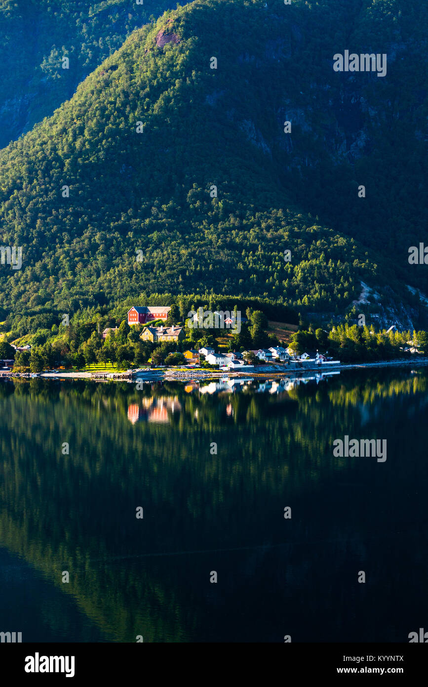 Still waters on Romsdal Fjord at dawn near Åndalsnes is a town in Rauma Municipality in Møre og Romsdal county. Norway. Stock Photo