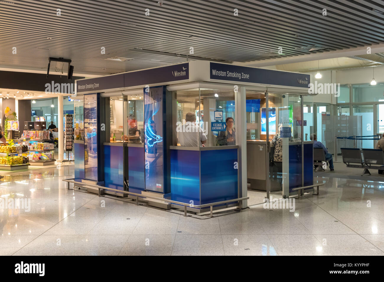 ATHENS, GREECE May 16, 2017 Tourists and travelers smoke cigarettes