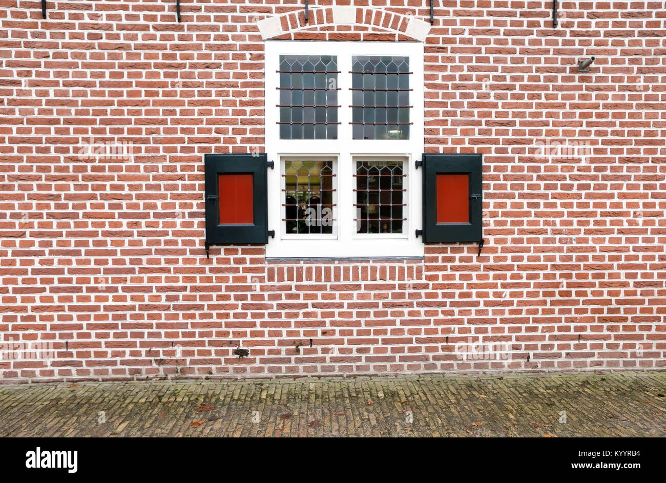 old red wooden window on brick wall Stock Photo - Alamy