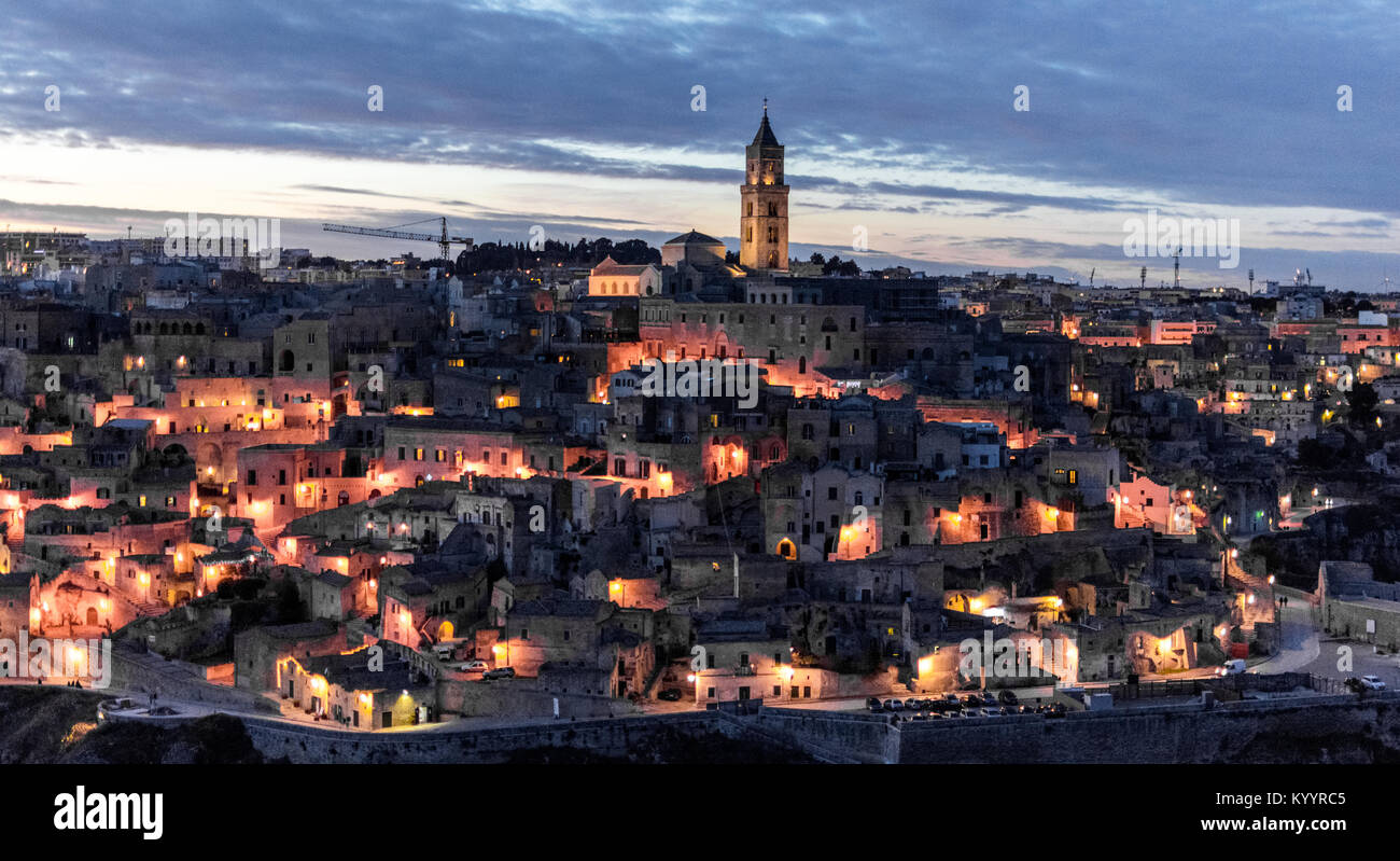 View of Matera from the caves on the other side of mountain's crest Stock Photo