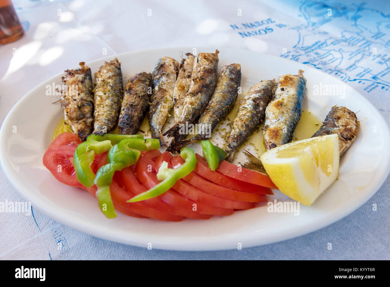 Seafood, grilled sardines served in traditional Greek tavern. Naxos