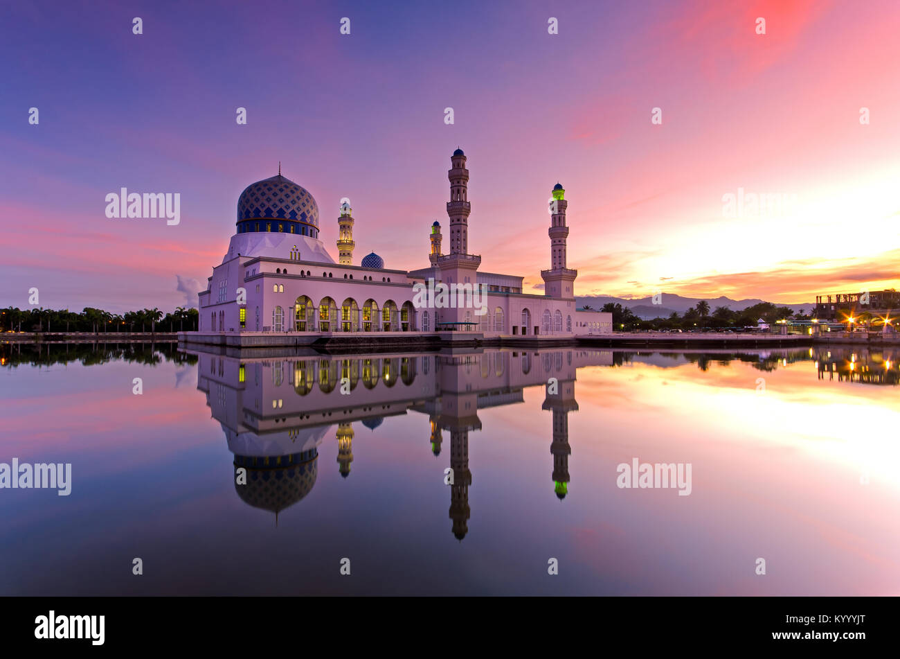Beautiful sunrise over Kota Kinabalu city floating mosque. The mosque is one of the most popular landmark destination in Sabah Borneo, Malaysia. Stock Photo