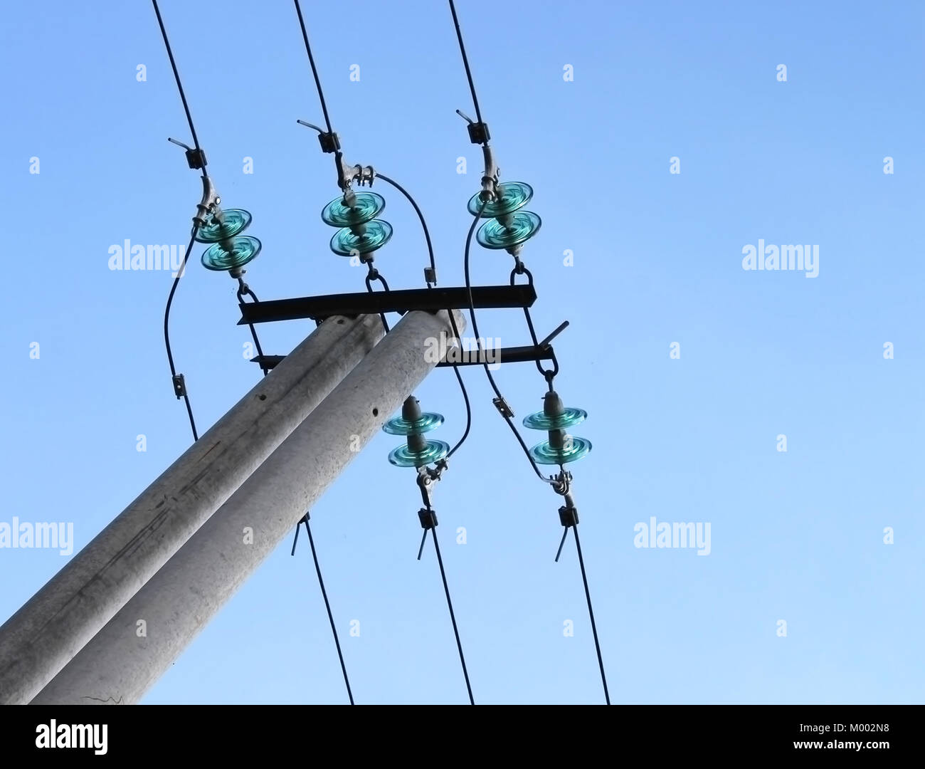 Blue electrical insulator (dielectric). Highvoltage (power) line Stock
