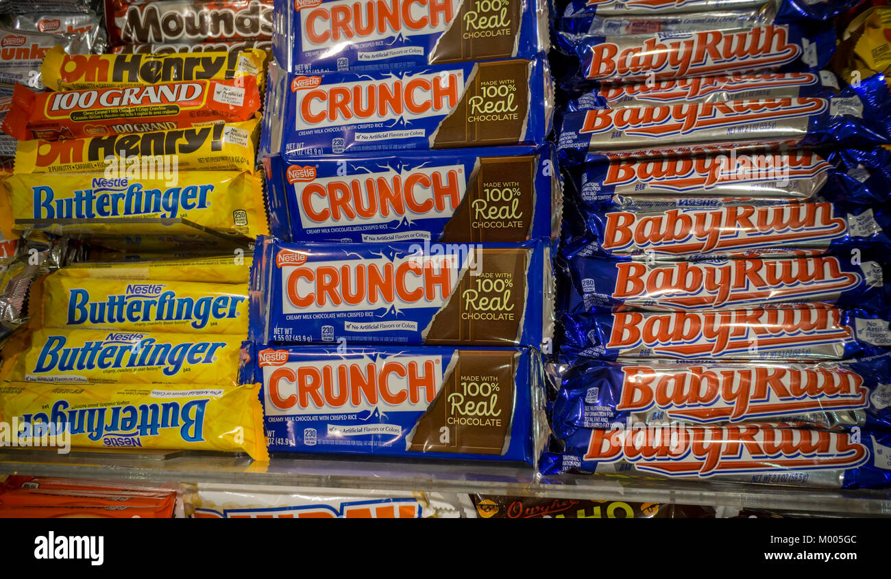 A selection of NestlÃ© brand candies among other brands on the shelves of a store in New York on Tuesday, January 16, 2018. Italian chocolatier and candy manufacturer Ferrero (and maker of the wildly popular Nutella) is buying NestlÃ©'s U.S. confectionary business for approximately $2.8 billion. Ferrero will now become the third-largest candy maker in the U.S. behind The Hershey Co. and Mars. (Â© Richard B. Levine) Stock Photo