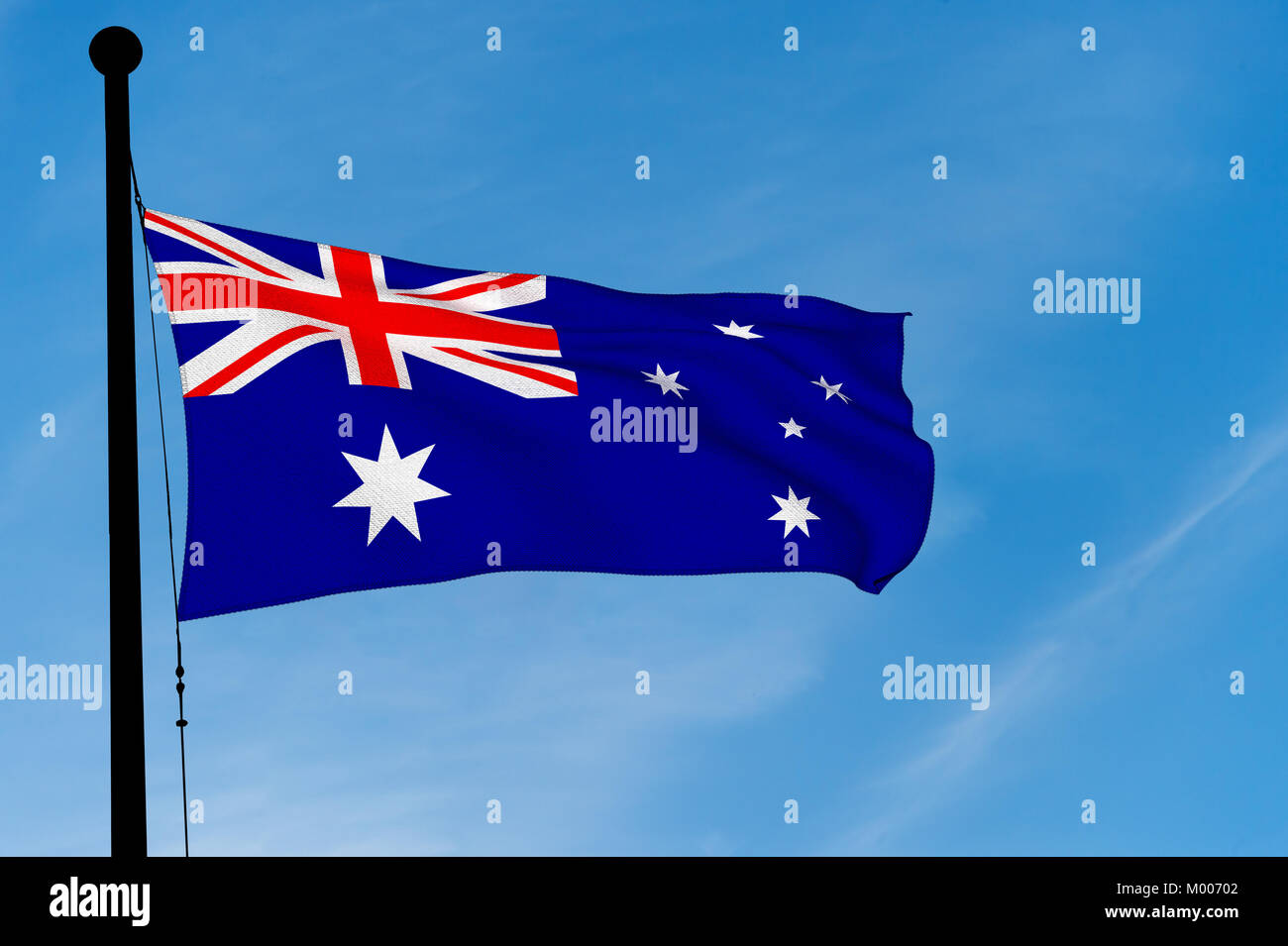 Australian Flag waving over blue sky (3D rendering) Stock Photo