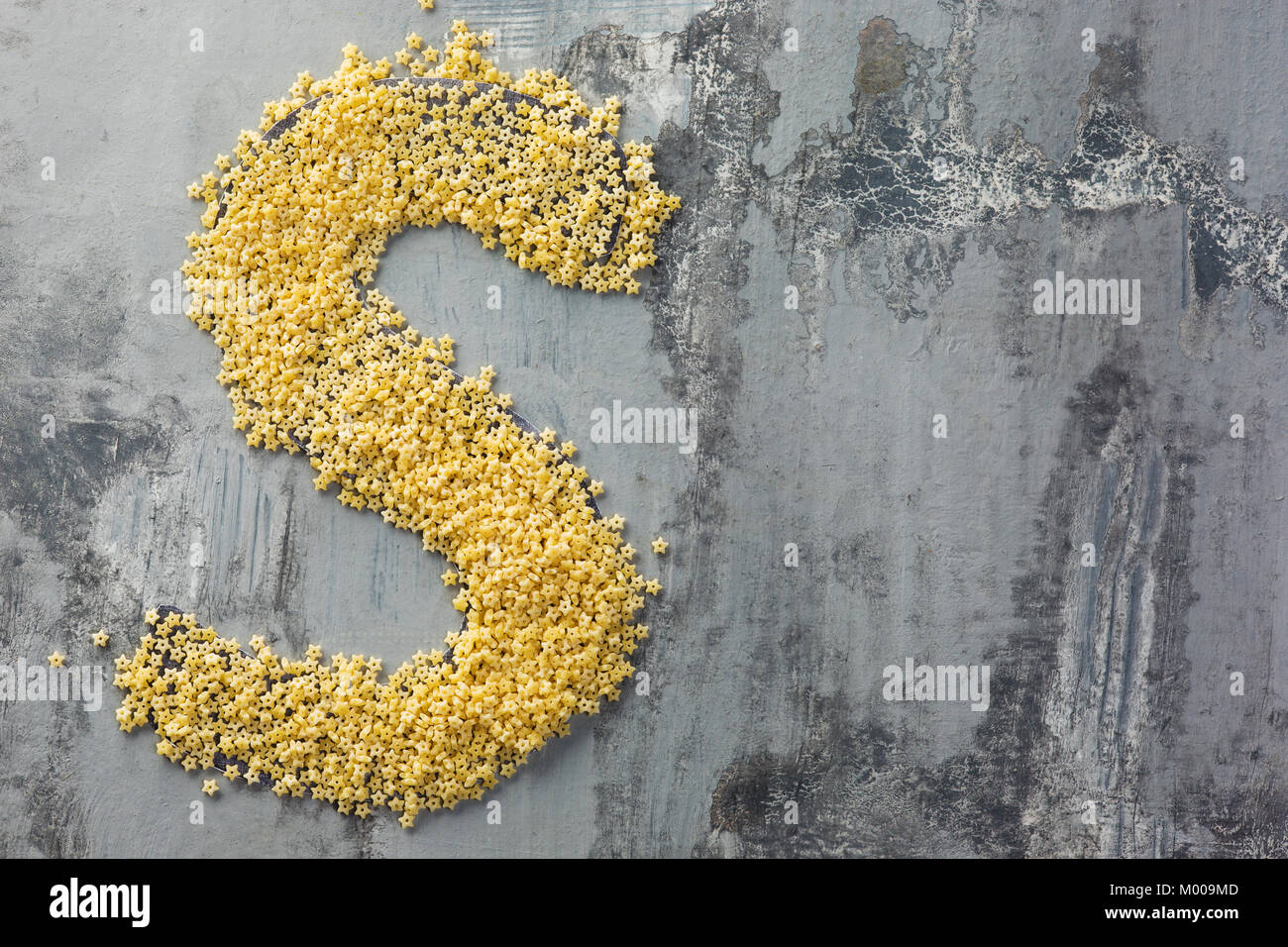Alphabet made of pasta. Letter S Stock Photo