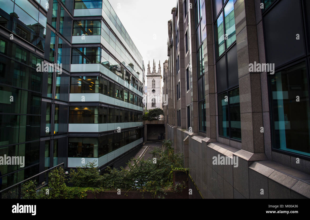 Old London church hemmed in by modern office buildings in the City. , 2017 Stock Photo