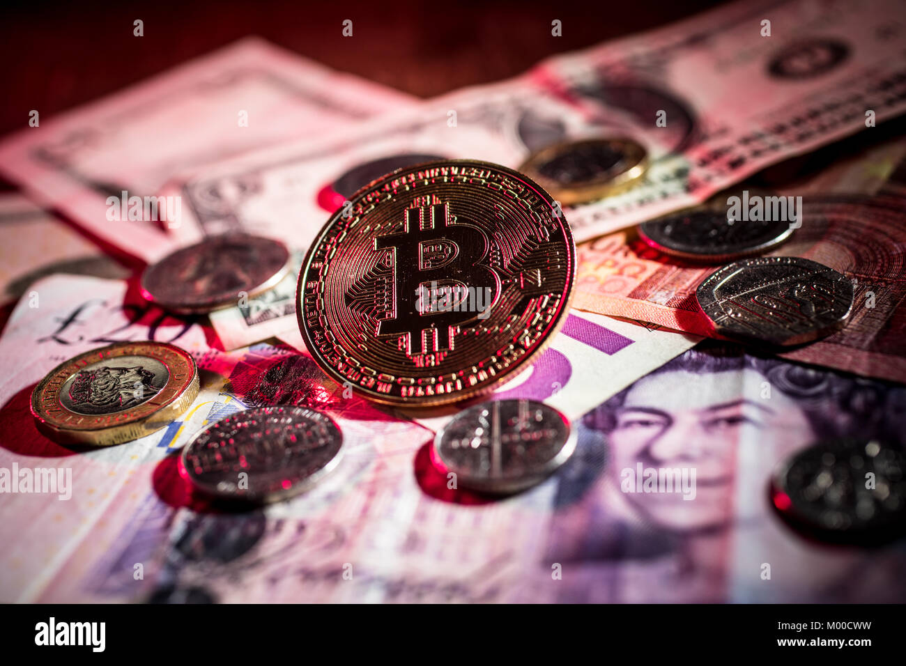 Crypto currency bitcoins with real money. Stock Photo