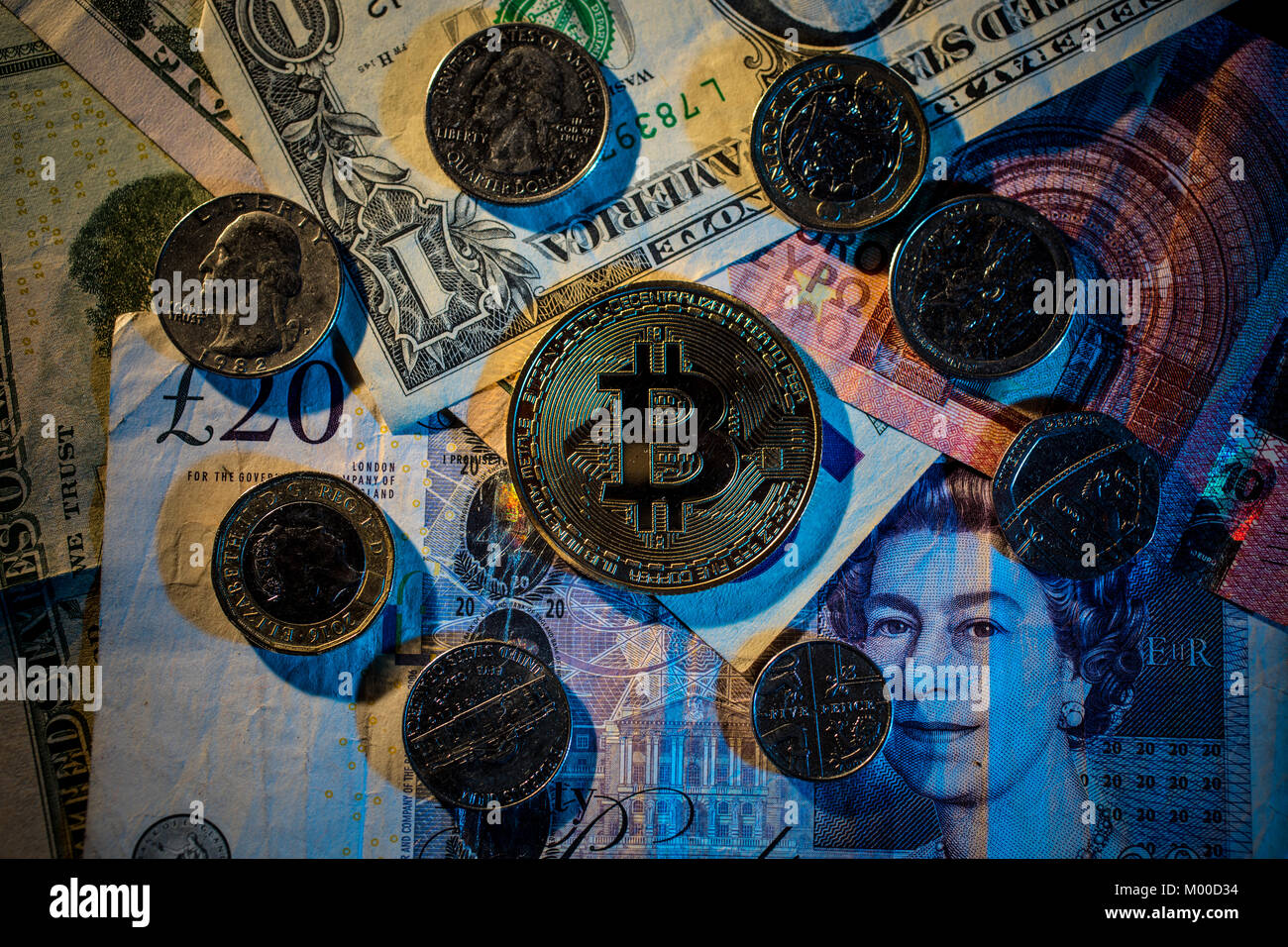 Crypto currency bitcoins with real money. Stock Photo