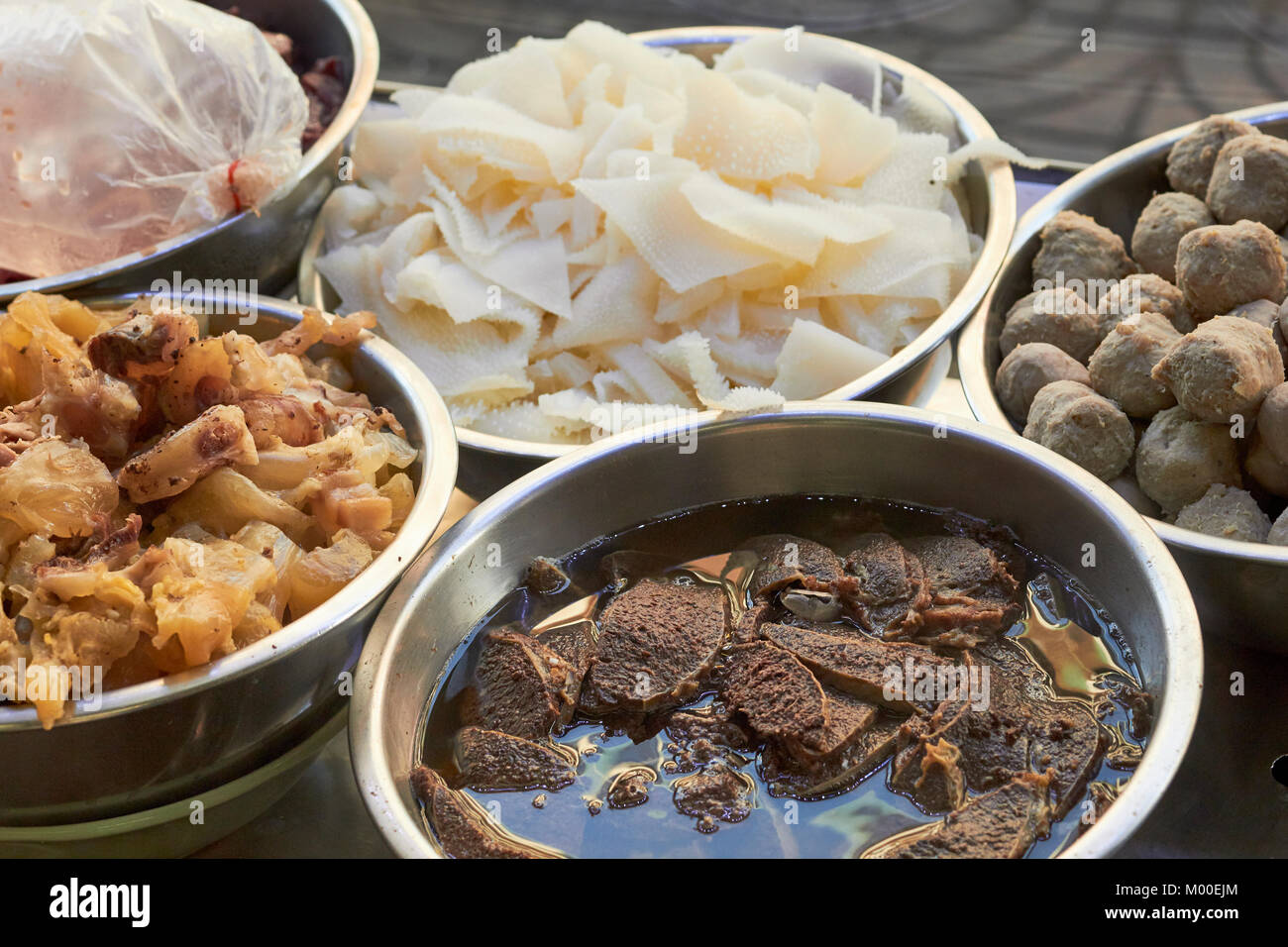 Bangkok street food vendor offering tripe and other beef offal Stock Photo