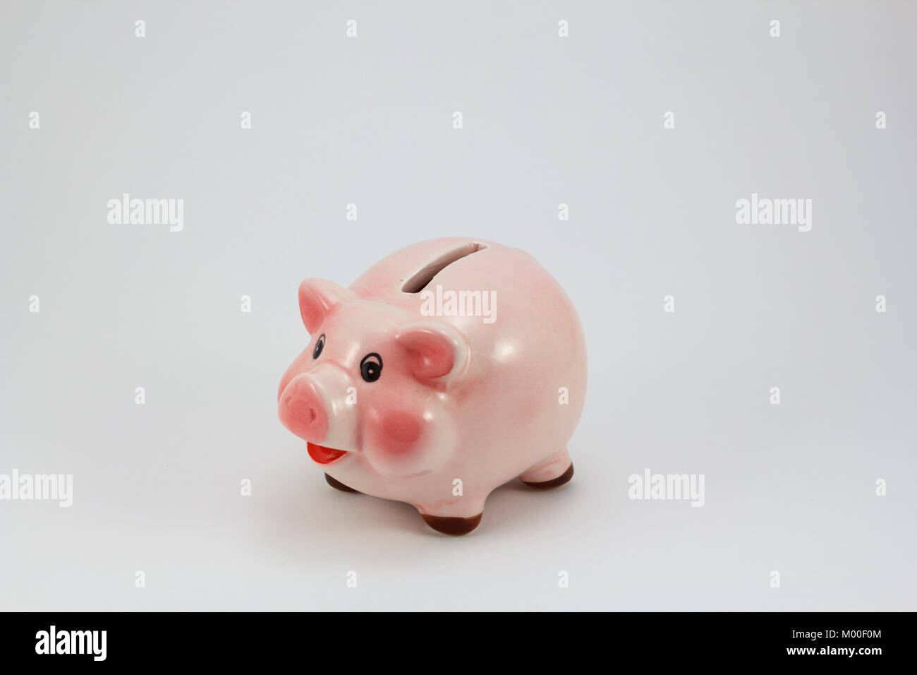 Ceramic pig piggy box, isolated in a white background Stock Photo