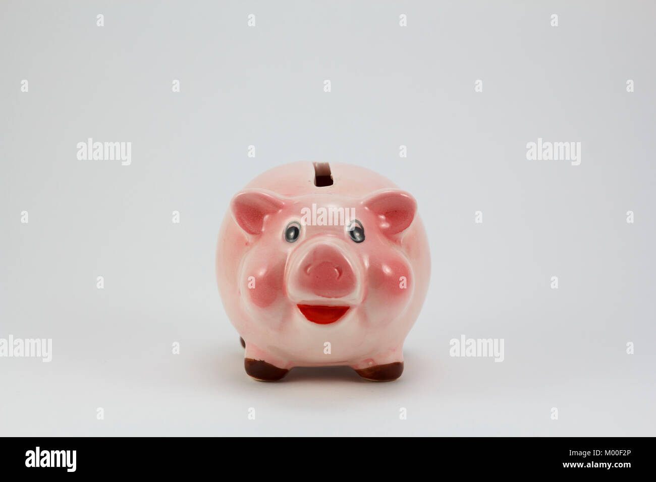 Ceramic pig piggy box, isolated in a white background Stock Photo