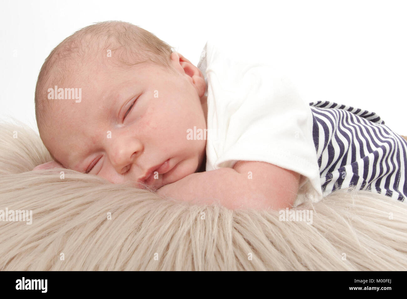beautiful 4 week old baby boy sleeping, nap time Stock Photo