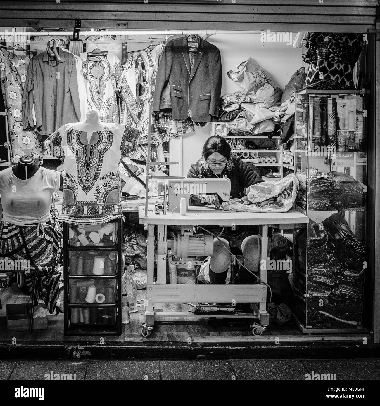 Stalls and Shoppers in the Oastler Shopping Centre, John Street market, Bradford, West Yorkshire Stalls and Shoppers in the Oastler Shopping Centre, John Street market, Bradford, West Yorkshire