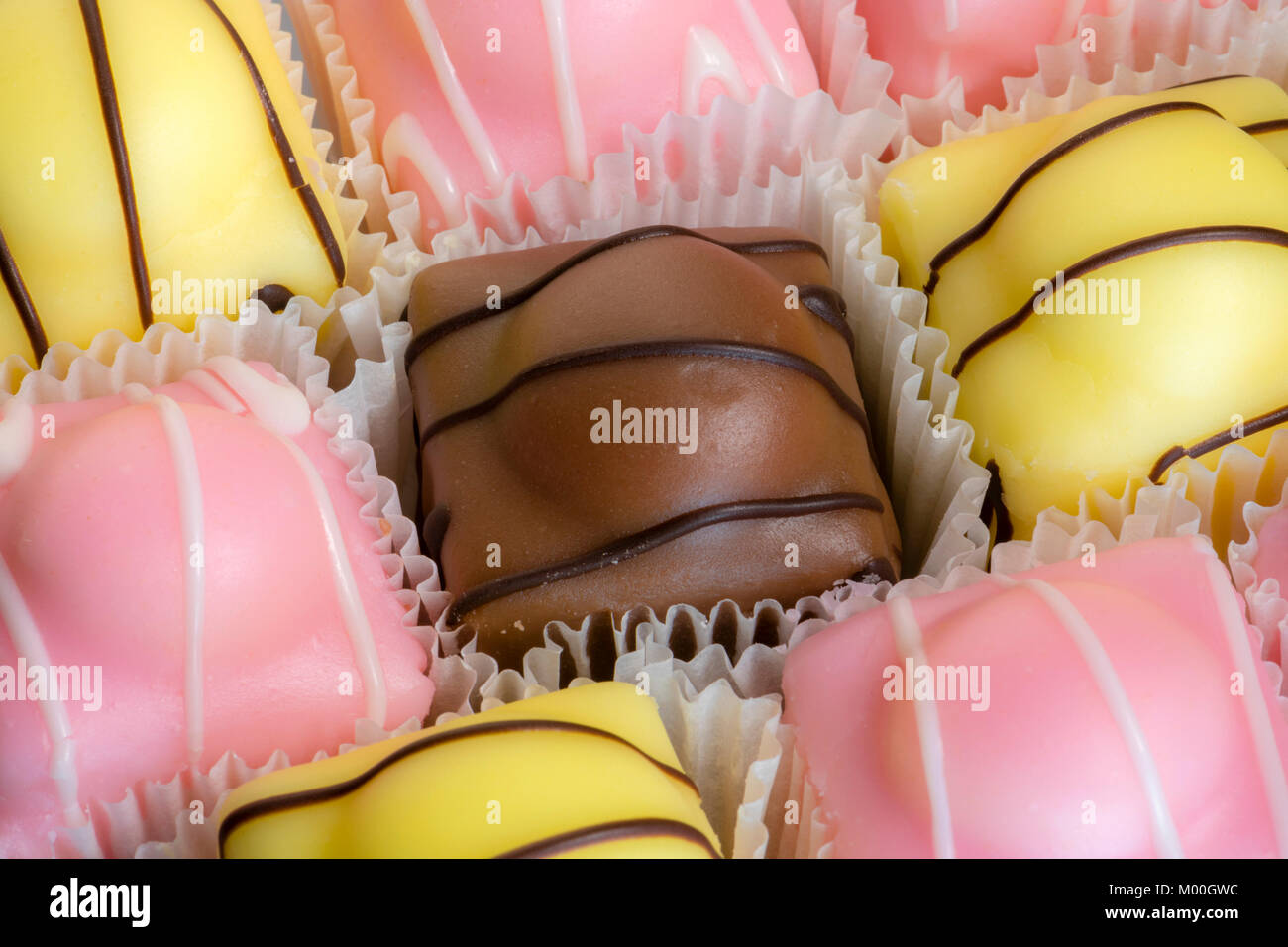 Fondant fancies cakes also known as French fancies Stock Photo Alamy