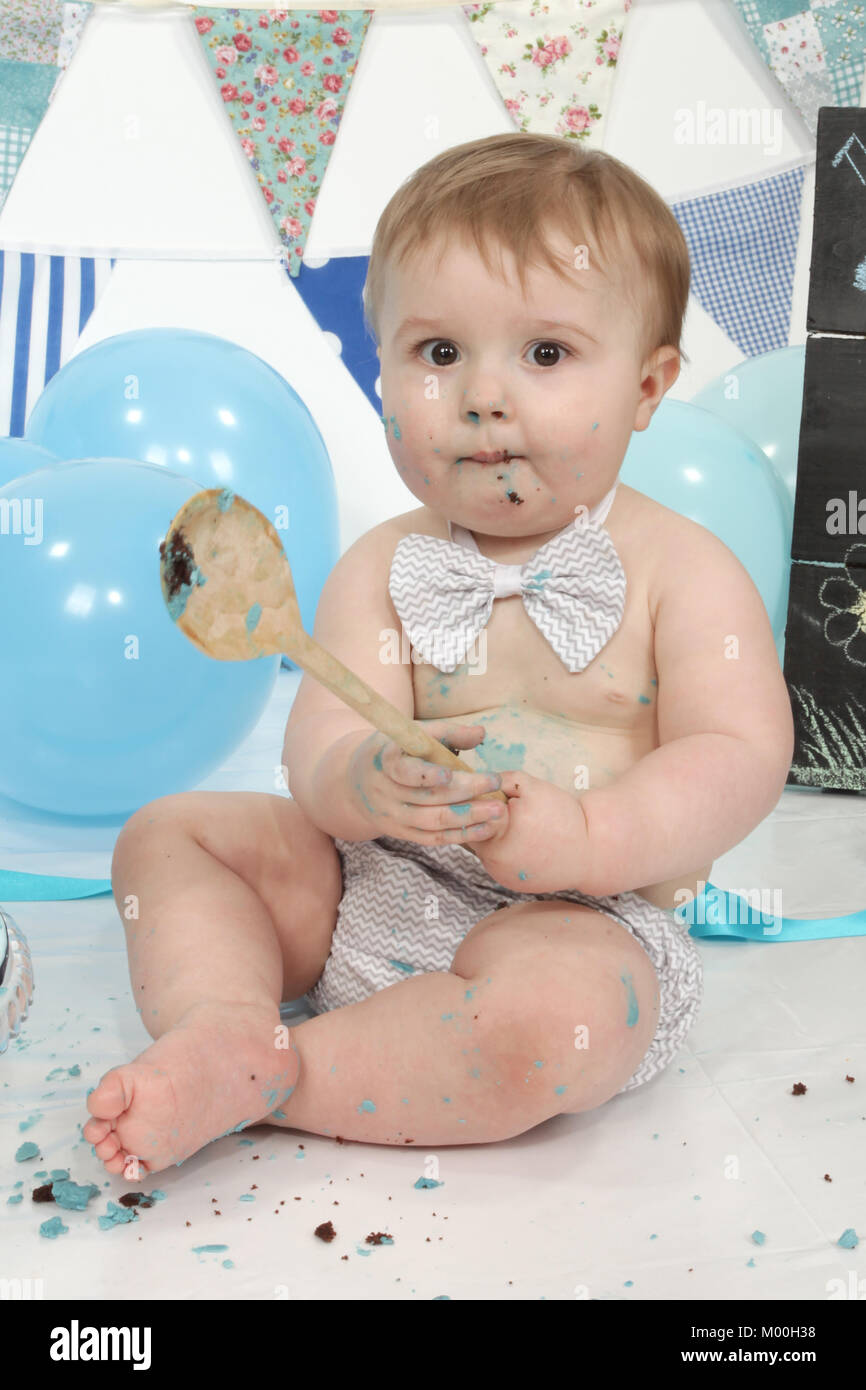 1 year old boy birthday party cake smash, fun food Stock Photo - Alamy
