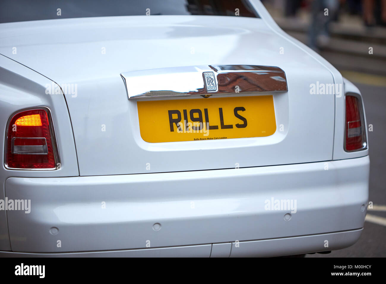 The tail lights personalised number of a white Rolls Phantom in London Stock Photo - Alamy