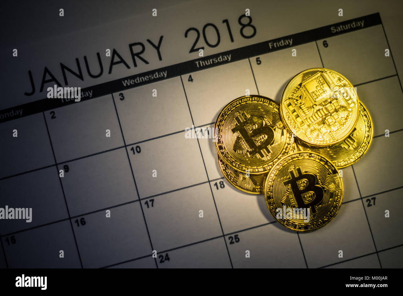 Bitcoin golden coins on 2018 calendar file Stock Photo