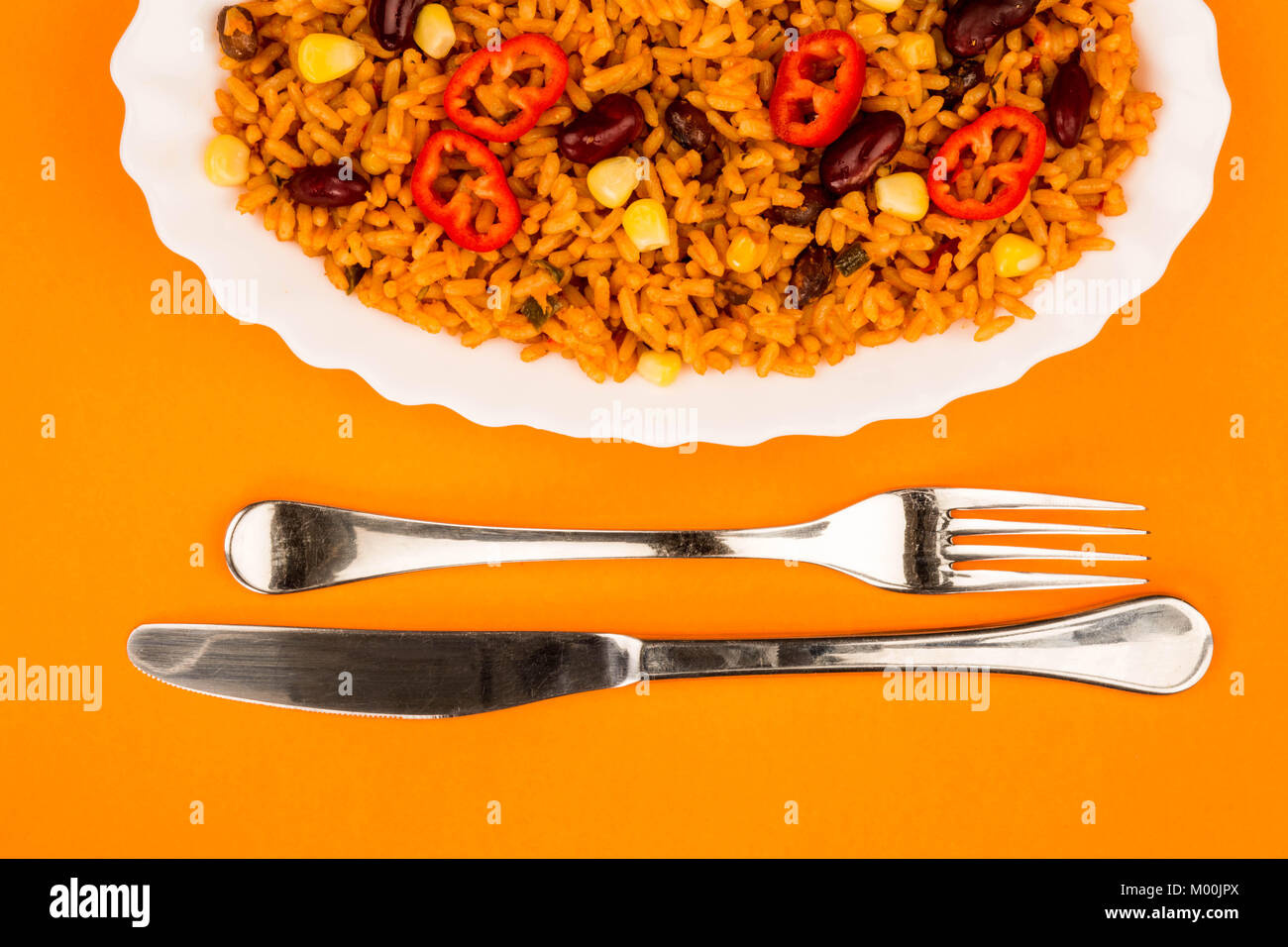 Mexican Style Spicy Rice With Kidney Beans and Red Chillies Against An