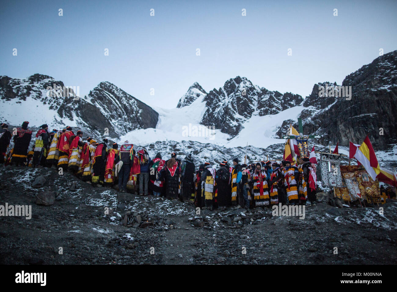 Cusco, Peru. 29th Dec, 2017. Members of the Nation Acomayo ascend to Ausangate Mountain, at 6362m, the snow covered has been affected by the climate change, years ago this area was covered by snow.Quyllur Rit'i or Star Snow Festival is a spiritual and religious festival held Annually at the Sinakara Valley in the Cusco Region of Peru. Groups of Quero indigenous people climb Ausangate Mountain, at 6362m, in search of the Snow Star Which is reputedly buried Within the mountain.According to the chroniclers, the Qoyllur Rit'i is the Christ that the Church sent painted on a rock at almost 5, Stock Photo