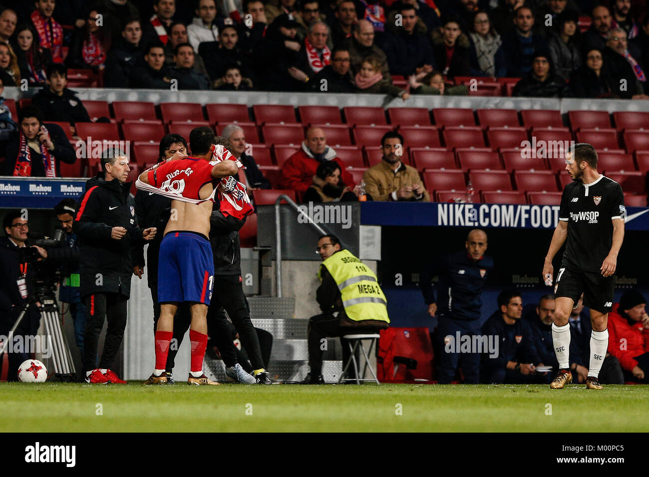 Diego Costa changes his shirt after breaking it during a play. Copa Stock  Photo - Alamy