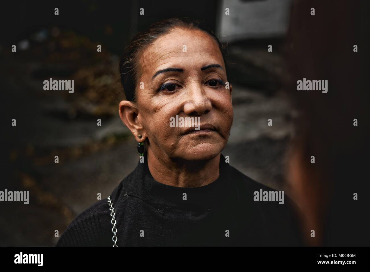 Caracas, Venezuela. 17th Jan, 2018. Aura Perez, relative Of Oscar Perez at the Morgue.Officials of the National Guard prevent people and the press from being near the Morgue in Caracas. relatives of the Inspector of the Cicpc gone rogue, Oscar Perez, approached the place to look for the body. The inspector died after a controversial police operation carried out by the government of Nicolas Maduro, 7 people died with him. Credit: Roman Camacho/SOPA/ZUMA Wire/Alamy Live News Stock Photo