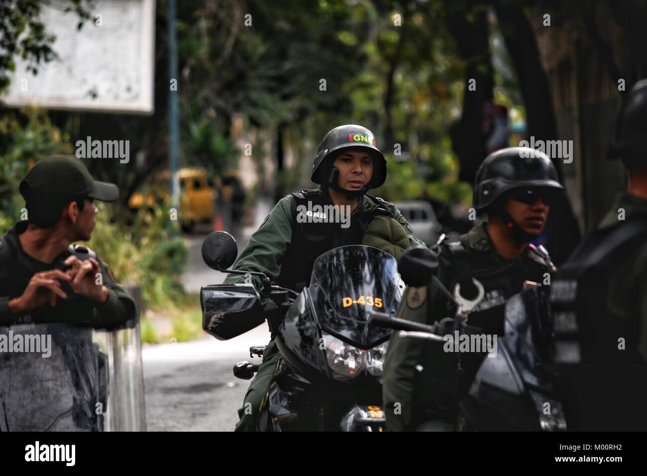Caracas, Venezuela. 17th Jan, 2018. Officials of the National Guard prevent people and the press from being near the Morgue in Caracas. relatives of the Inspector of the Cicpc gone rogue, Oscar Perez, approached the place to look for the body. The inspector died after a controversial police operation carried out by the government of Nicolas Maduro, 7 people died with him. Credit: Roman Camacho/SOPA/ZUMA Wire/Alamy Live News Stock Photo