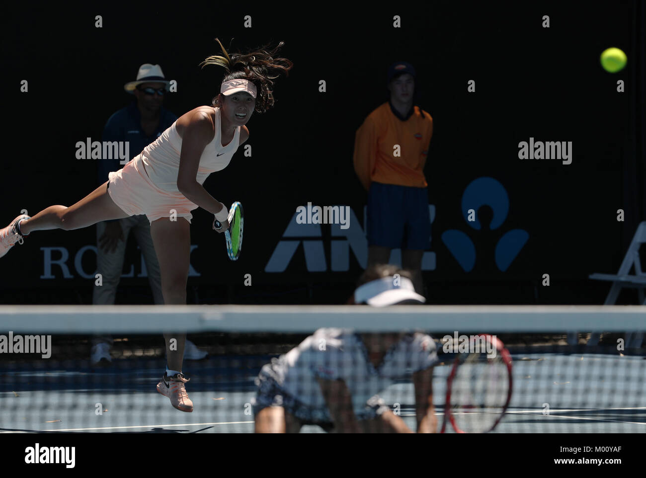 Melbourne, Australia. 18th Jan, 2018. Yang Zhaoxuan (L) of China and Aoyama Shuko of Japan compete during the women's doubles first round match against Taylor Townsend of the U.S. and Renata Voracova of the Czech Republic at Australian Open 2018 in Melbourne, Australia, Jan. 18, 2018. Yang Zhaoxuan and Aoyama Shuko won 2-0. Credit: Bai Xuefei/Xinhua/Alamy Live News Stock Photo