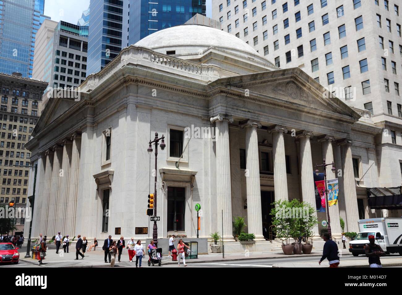 PHILADELPHIA - JUNE 11: People walk past old Girard Bank on June 11, 2013 in Philadelphia. As of 2012 Philadelphia is the 5th most populous city in th Stock Photo