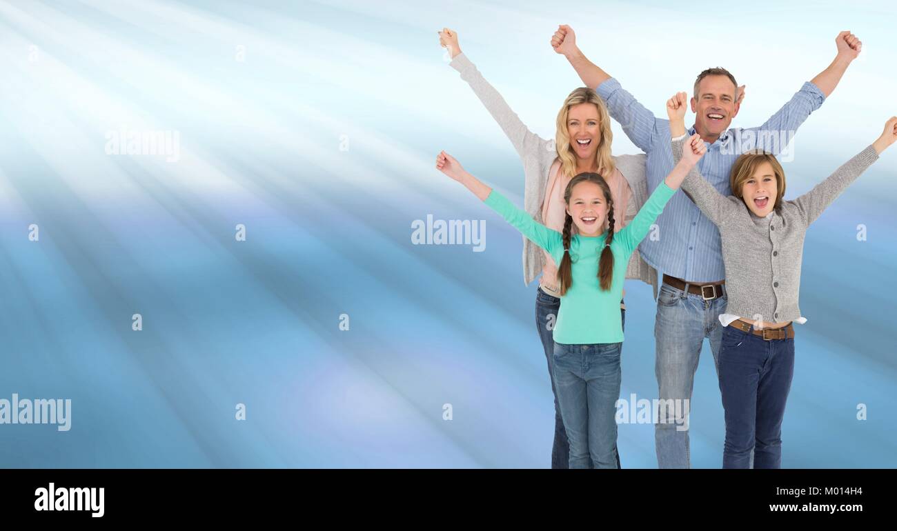 Family celebrating with joy with blue shining light streaks Stock Photo