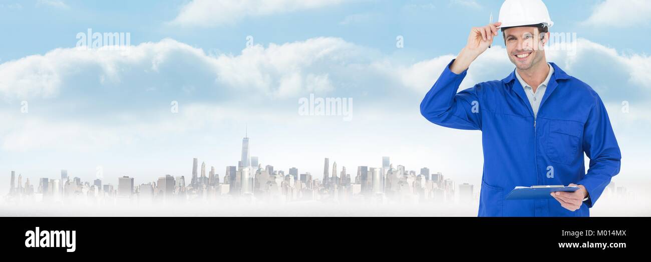 Construction Worker engineer over large city buildings Stock Photo