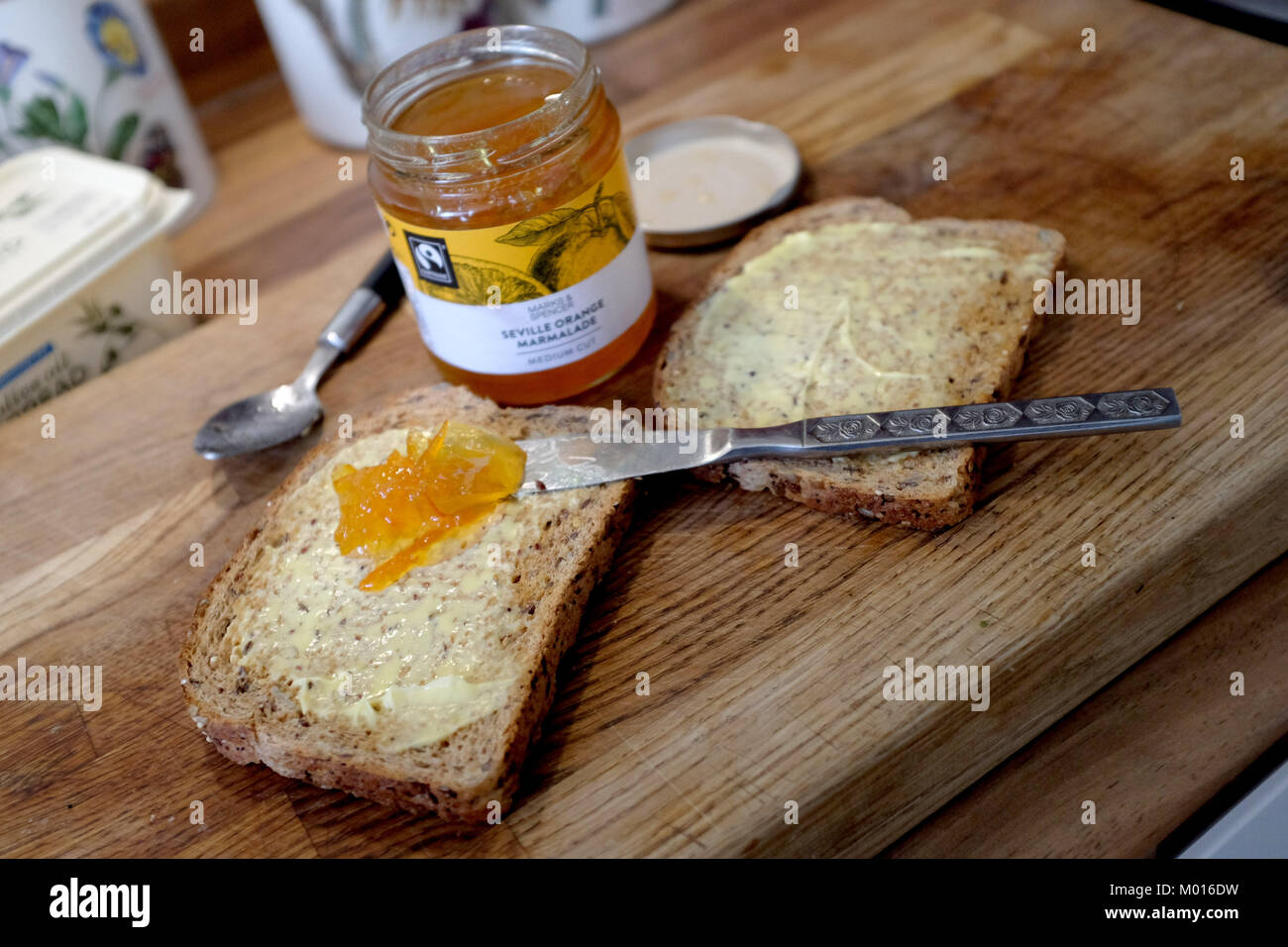 Wholemeal brown toast with M&S Seville Orange Marmalade Stock Photo
