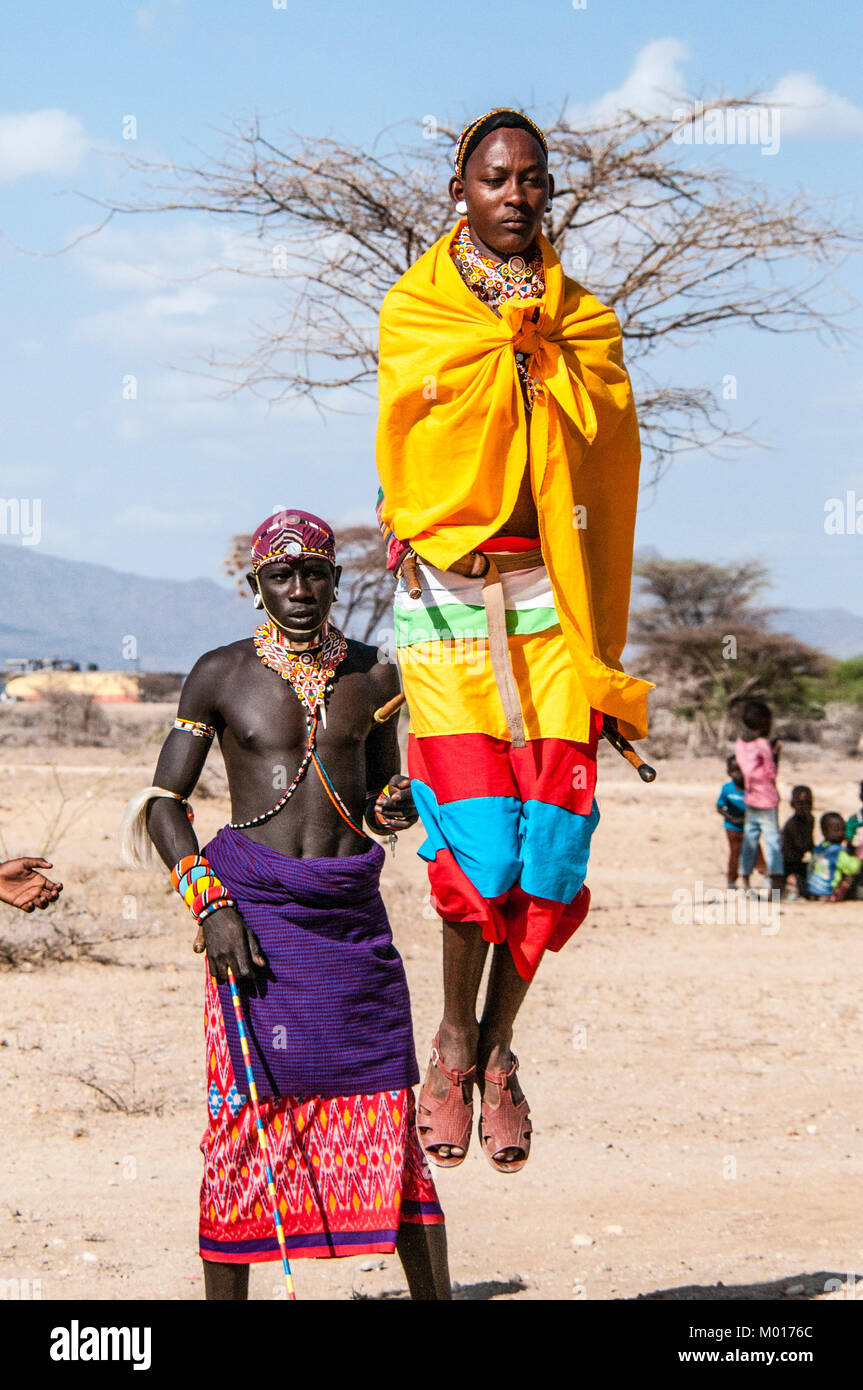 Samburu Maasai man or warrior doing the traditional jumping dance, Samburu, Kenya, East Africa Stock Photo
