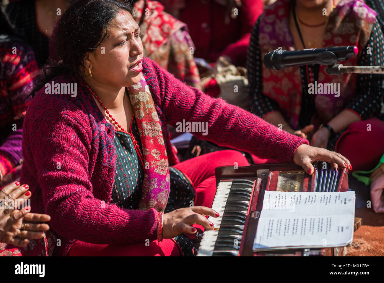 Woman play harmonium, Nepal, Asia Stock Photo Alamy