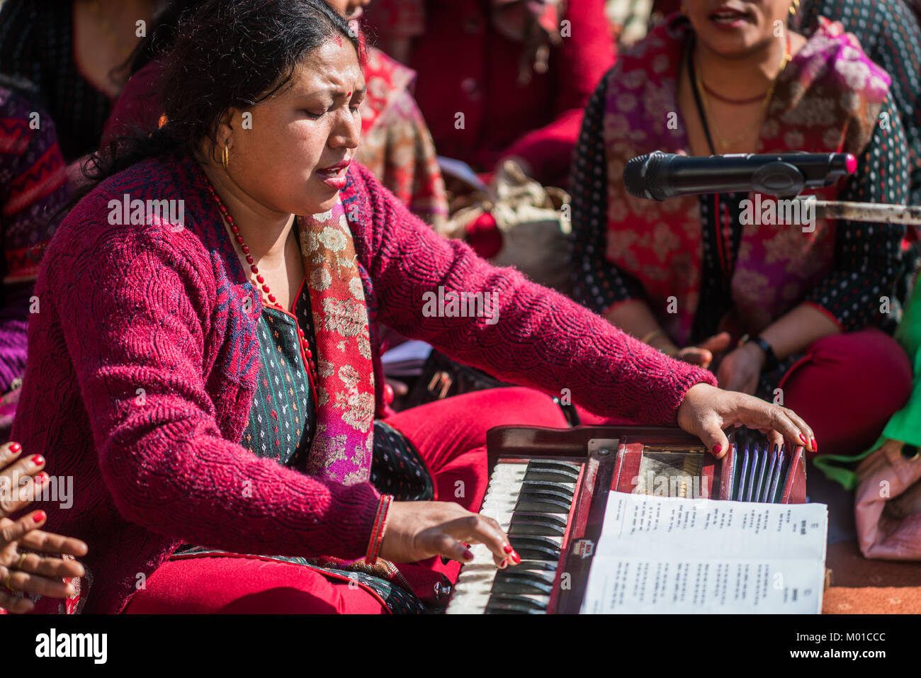 Woman play harmonium, Nepal, Asia Stock Photo Alamy