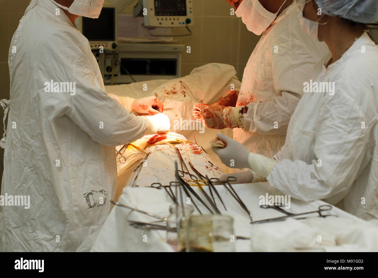 City Gomel, Belarus 01 June 2017,Oncological hospital, surgical department.Doctors in the operating room make an adjustment Stock Photo
