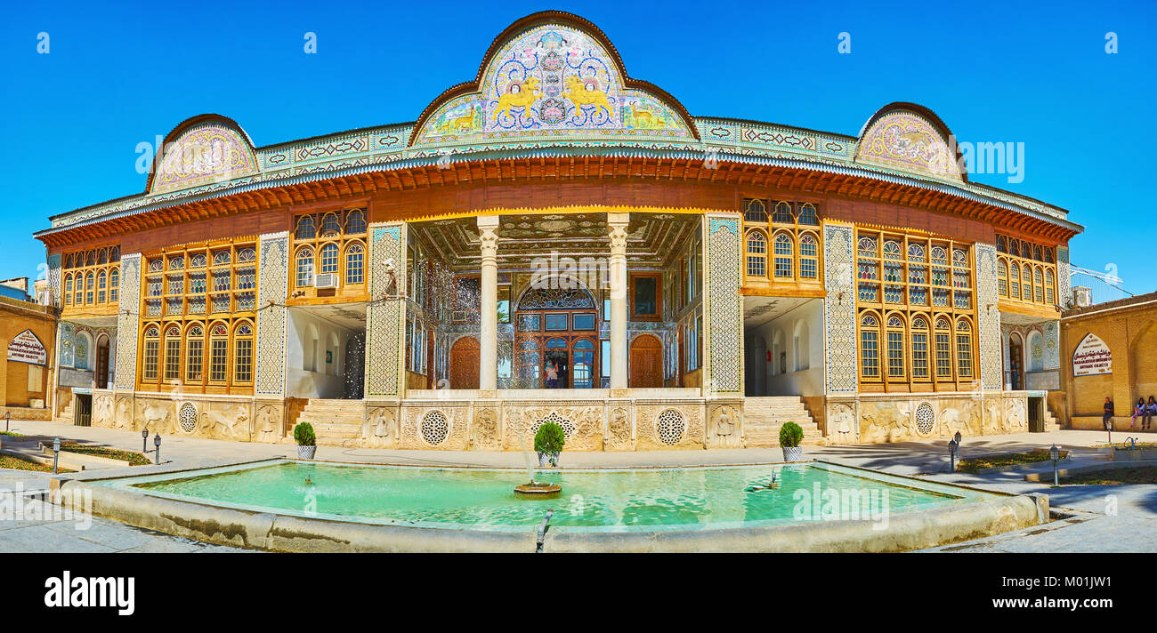 SHIRAZ, IRAN - OCTOBER 12, 2017: The facade of Qavam (Ghavam) House of Naranjestan complex with rich tiled decors, stone carvings and masterpiece mirr Stock Photo
