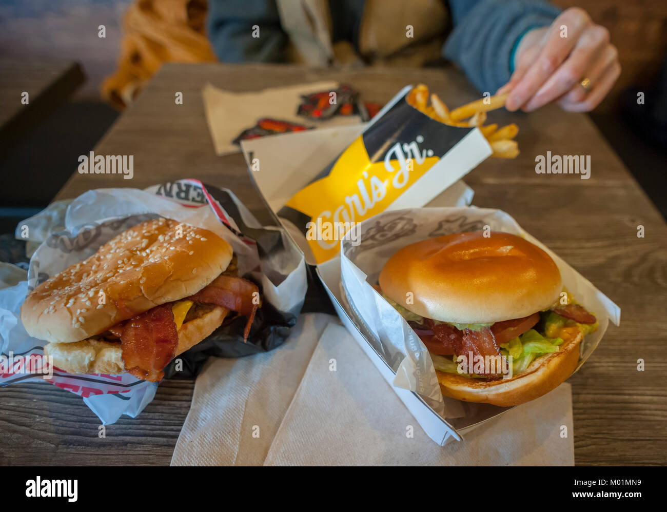 Hamburgers and fries at the first Carl's Jr. in New York in Brooklyn in ...