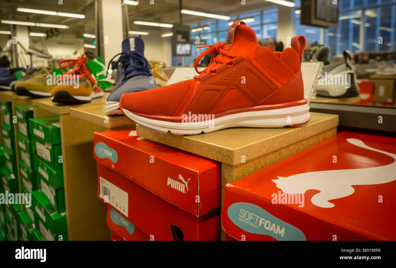 Puma brand sneakers in a shoe store in New York on Friday, January 12,  2018. The French company Kering will divest itself of Puma, returning 70  percent of the shares to investors