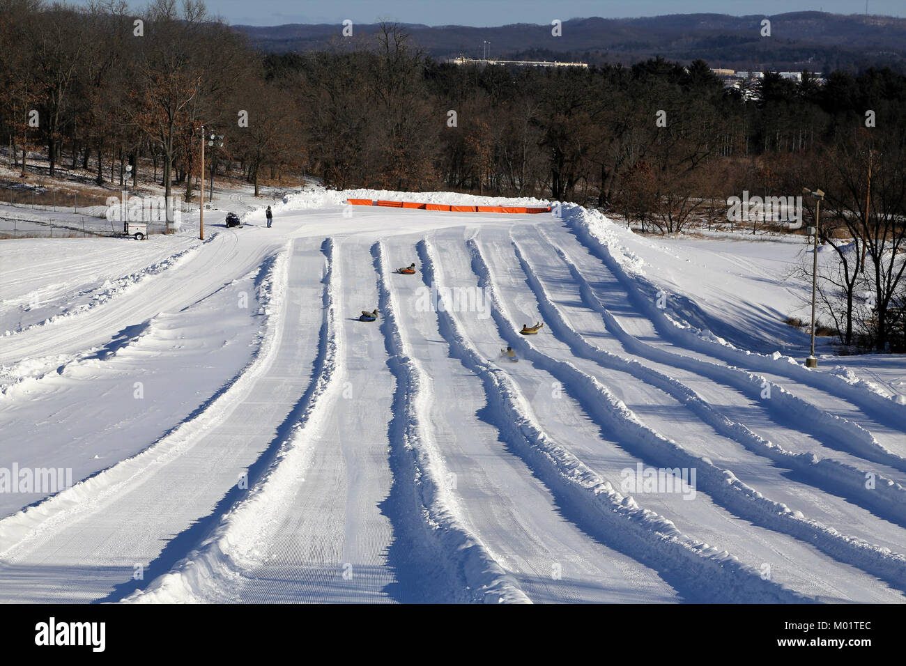 Snowtubers slide down snowtubing lanes at Whitetail Ridge Ski Area on
