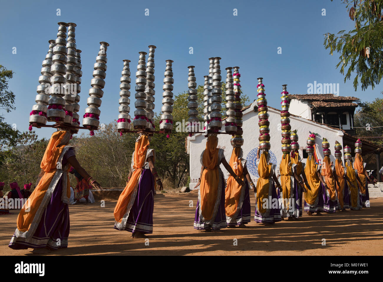 Women performing the Rajasthan and Gujarati Bhavai pot dance, celebrating women's efforts to carry water in the desert, Udaipur, Rajasthan, India Stock Photo