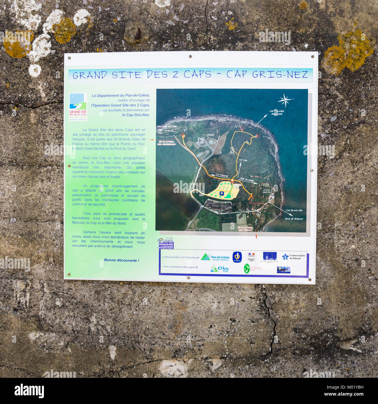 AUDINGHEN, FRANCE - JUNE 30, 2010: map of cape on the old bunker wall at the cape Cap Gris-Nez in Cote d'Opale region. The cliffs of Cap Gris-Nez are  Stock Photo