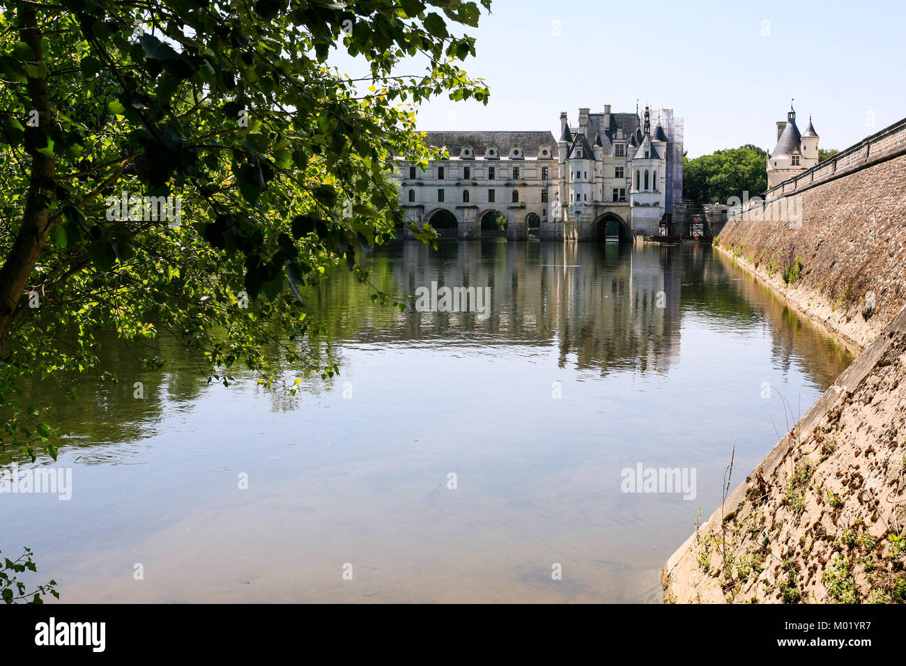 CHENONCEAUX, FRANCE - JULY 8, 2010: view of Chateau de Chenonceau on canal of Cher river. The current palace was built in Indre-et-Loire departement o Stock Photo