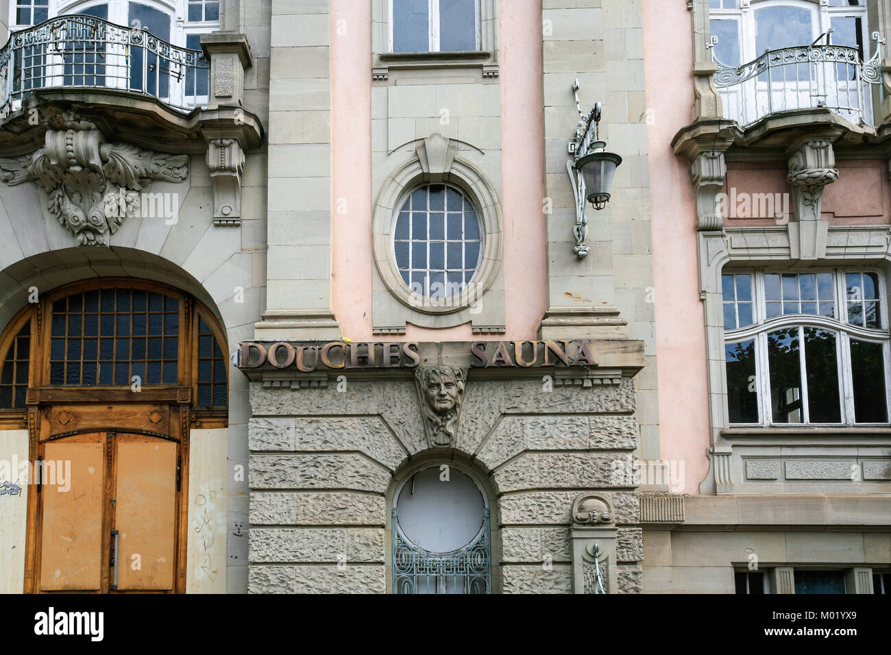 COLMAR, FRANCE - JULY 11, 2010: facade of urban house in Colmar city. Colmar is the third-largest commune of the Alsace region, town is considers itse Stock Photo
