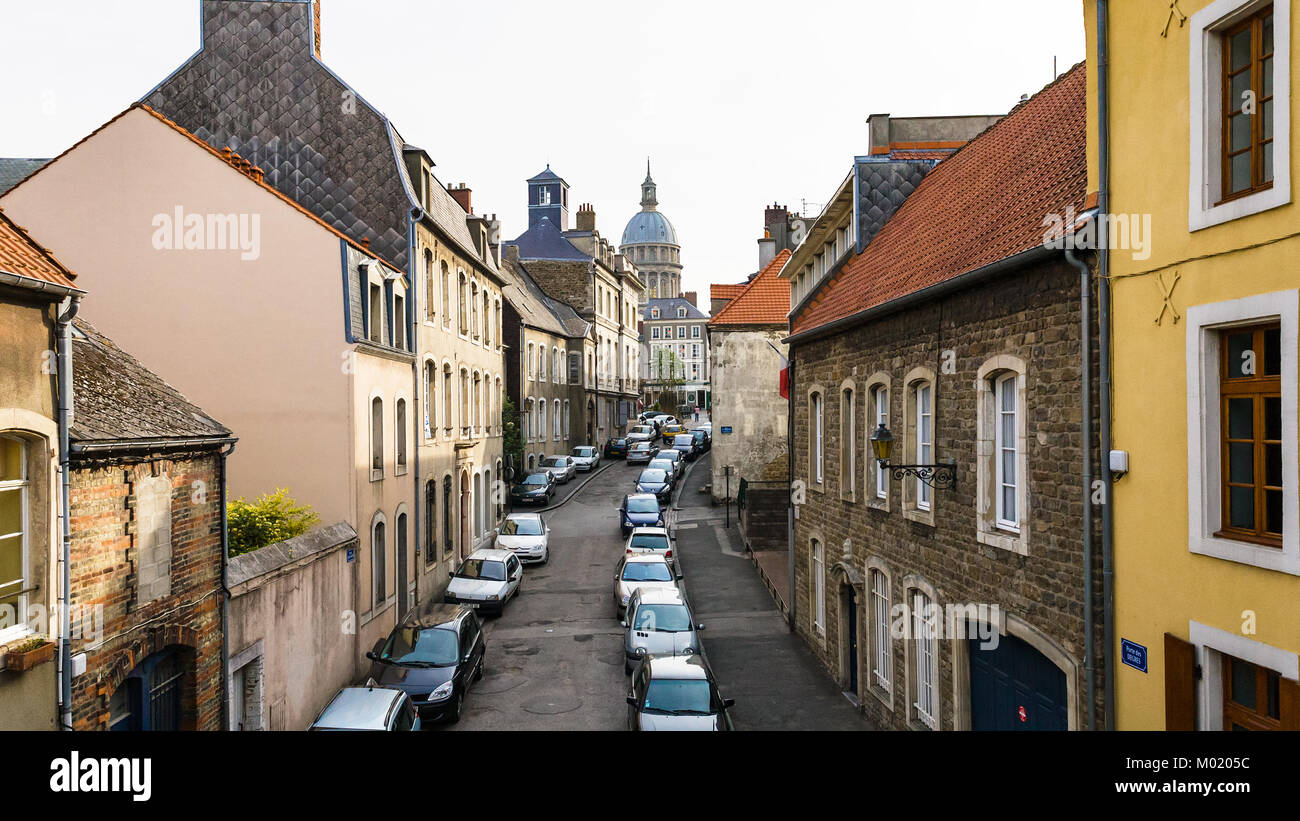 BOULOGNE-SUR-MER, FRANCE - JULY 1, 2010: view of street Rue du Puits d'Amour and dome of Basilica of Notre-Dame de Boulogne from Porte des Degres (the Stock Photo