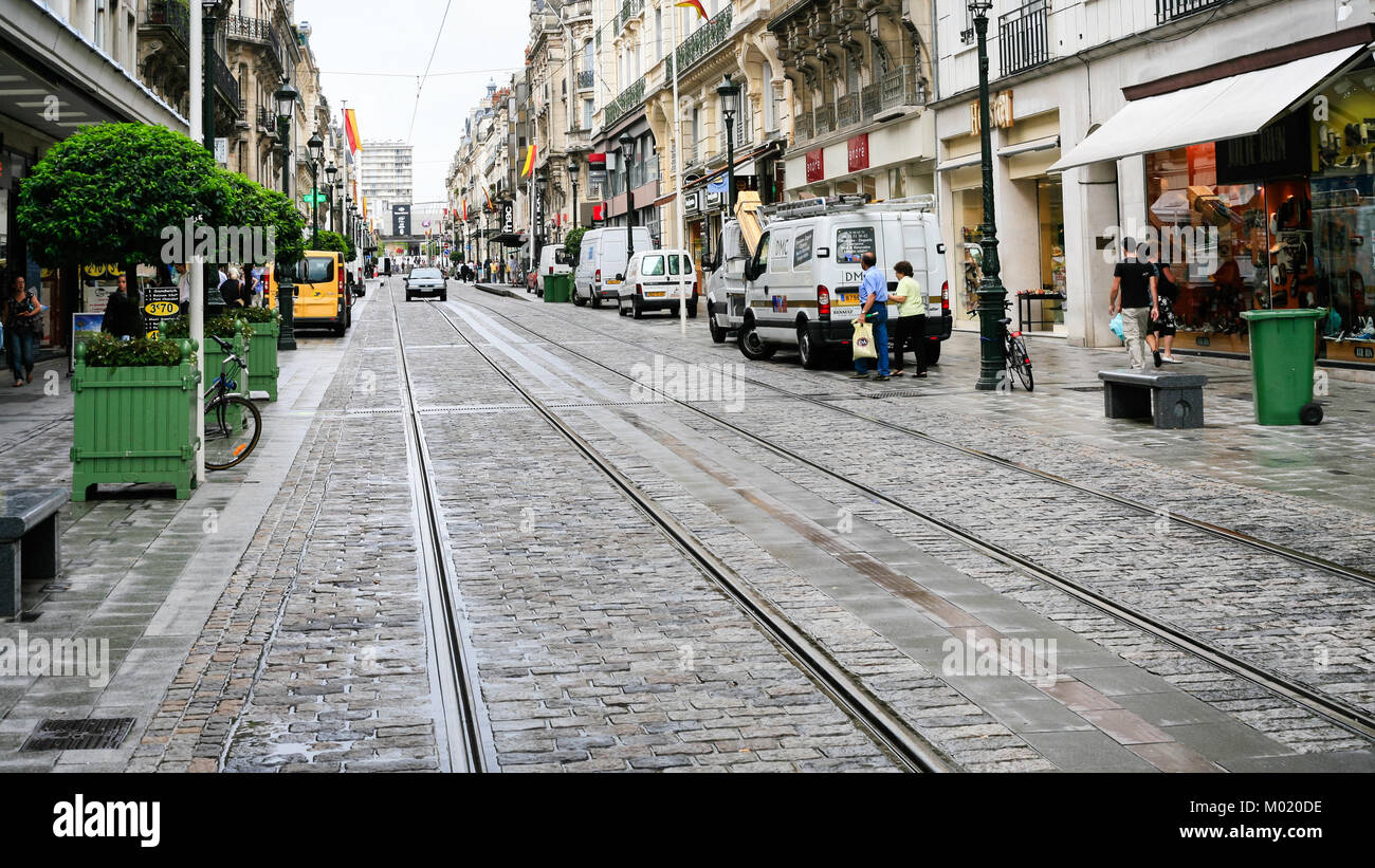 ORLEANS, FRANCE - JULY 9, 2010: people near shops on street Rue de la Republique in Orleans city. Orleans is the capital of the Loiret department and  Stock Photo